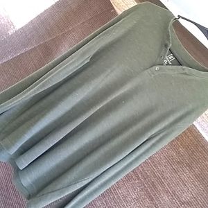 Henley warm pullover with three button neck.